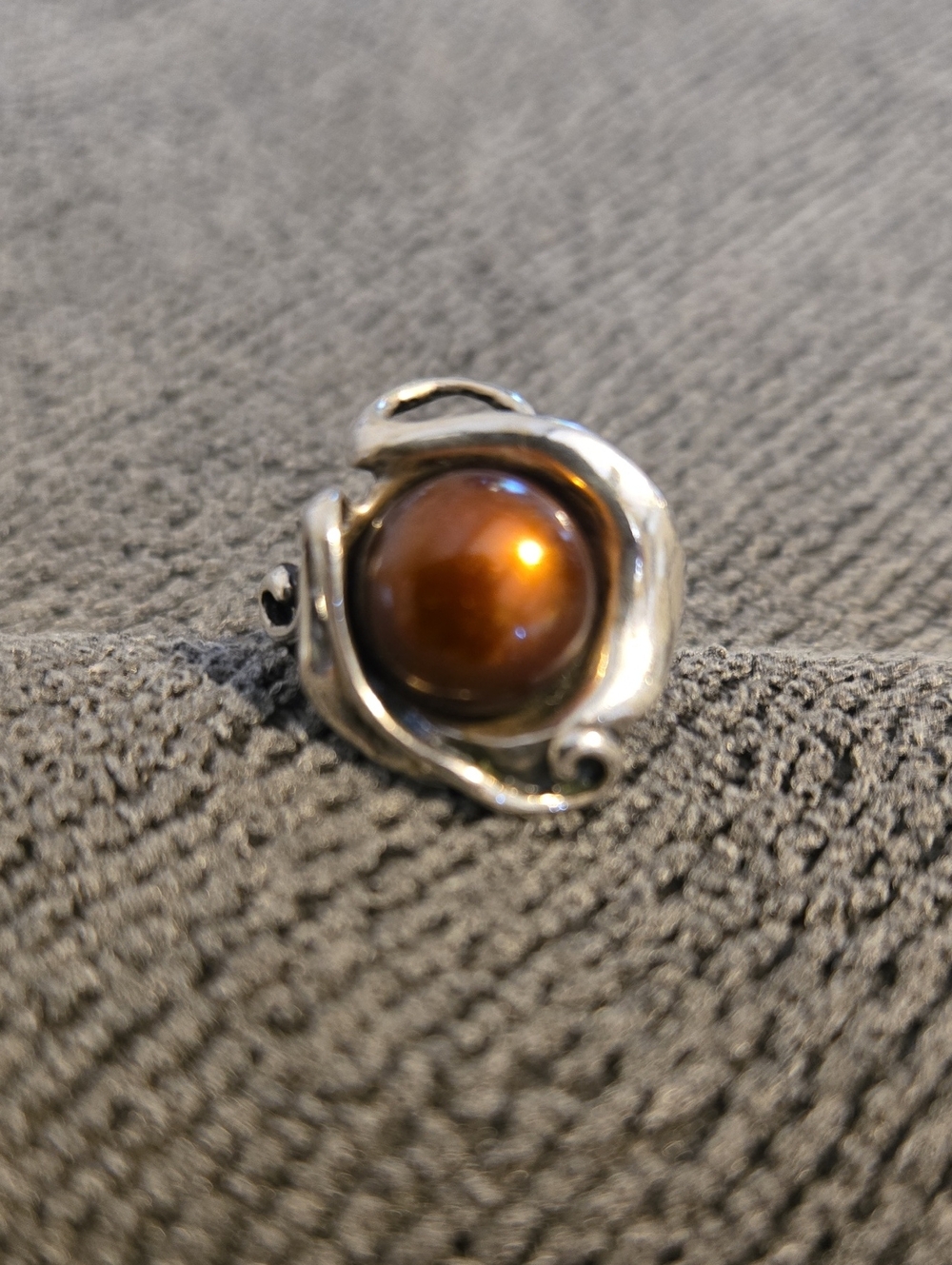 Sterling Silver Israel Swirl Ring with Brown Amber-Look Cabochon.